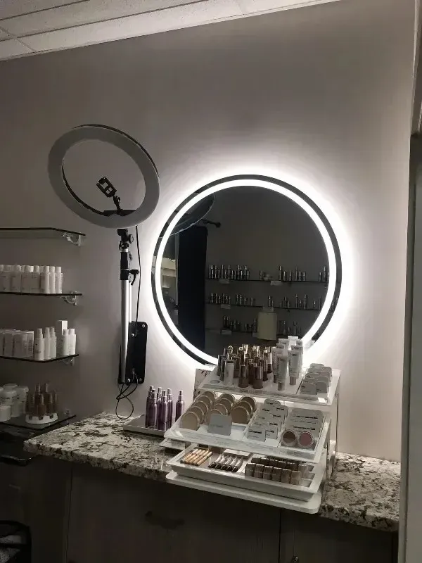 Simply Faces makeup station with professional lighting